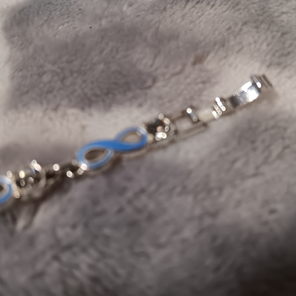 Blue enamel and crystal infinity bracelet. - Picture 7 of 14